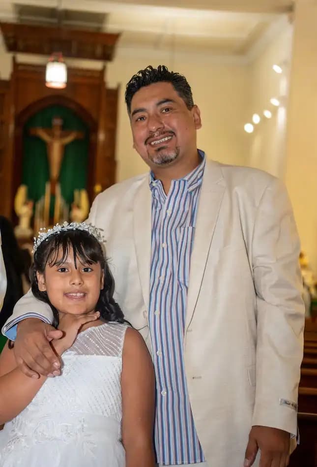 Nestor Fajardo, master tile specialist working on a bathroom installation